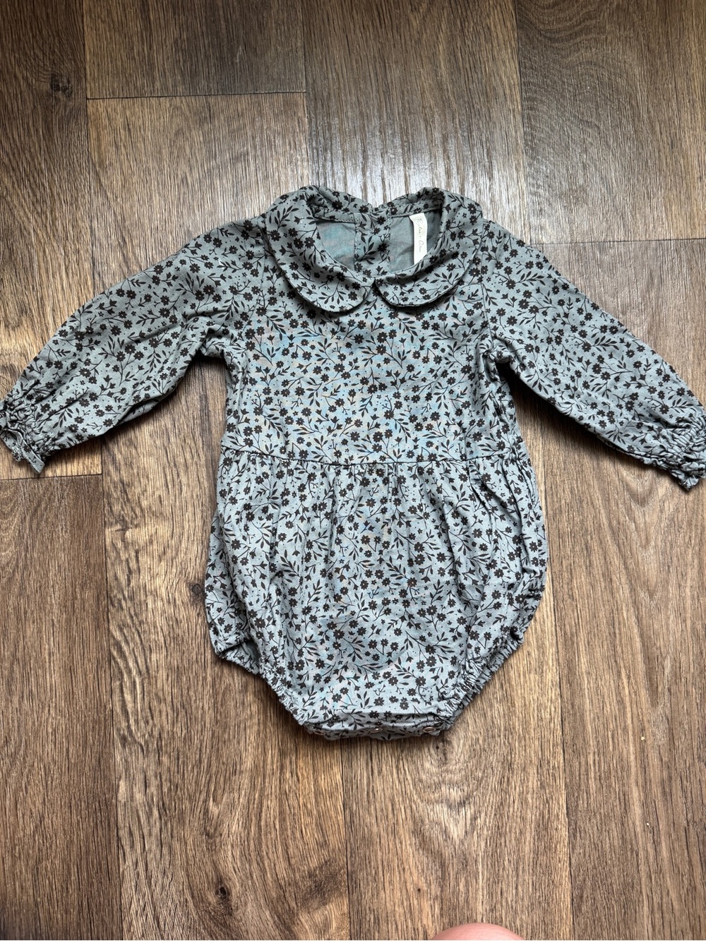 Rylee + Cru Cora Romper in Indigo Meadow with Floral Pattern, Peter Pan Collar